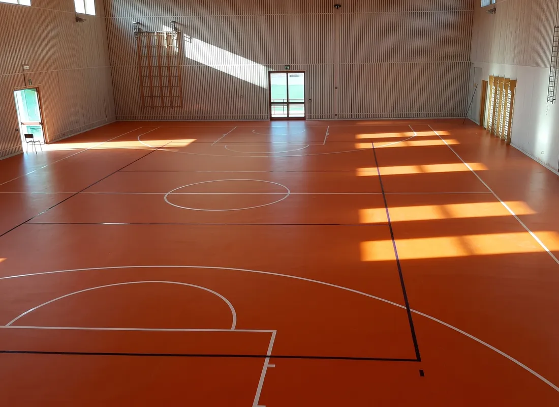 Court with markings for basketball, volleyball and handball